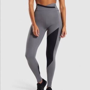 Gymshark Asymmetrical Cross-Front High-Waist Pocket Leggings in Grey and Black